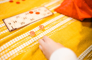 Happy father and child playing board game at home - happiness and family concept.