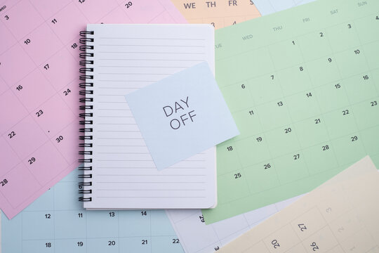 Day off - workplace message in the office. Concept of absence from work and day off