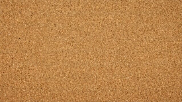 Image showing a close-up of a textured brown surface, possibly sand or a similar material. The old image name is 1868.