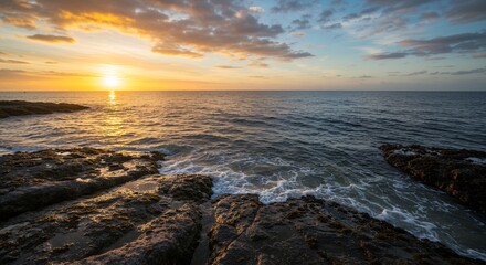 Sunset Over Ocean with Rocks