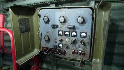 detailed view of military control systems, closeup of vintage military turret electronics and wiring © bisonov