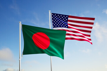 flags of  bangladesh and United States of America over blue sky background.