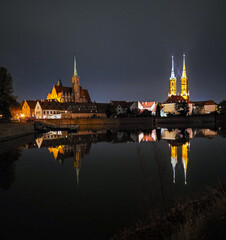 Wroclaw, Poland. Night panorama of island Ostrow Tumski and Collegiate Church of the Holy Cross in Wroclaw.