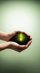 Hands holding soil with glowing plant, symbolizing growth and sustainability.