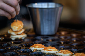 Golden brown mini pancakes at the Zurich Christmas Market, Switzerland