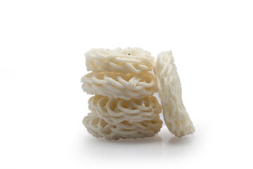 Indonesian snack krupuk or kerupuk deep fried cracker made from starch isolated on white background