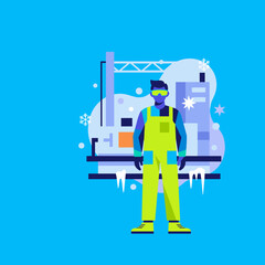 Industrial worker in protective gear stands outside at a snowy construction site Winter labor concept