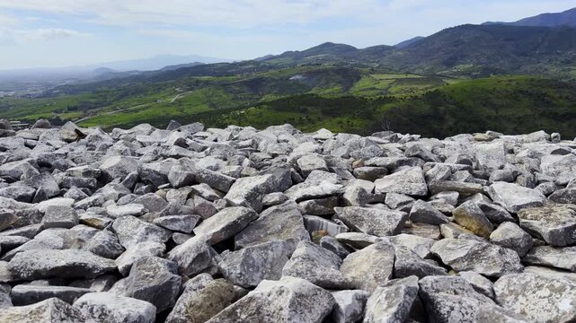 Beautiful Green Mountains Landscape Behind Pieces of Rocks