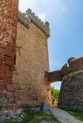 Exterior view of Castelldefels Castle, a 10th-century fortress on a sunny summer day