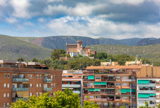 Exterior view of Castelldefels Castle, a 10th-century fortress on a sunny summer day