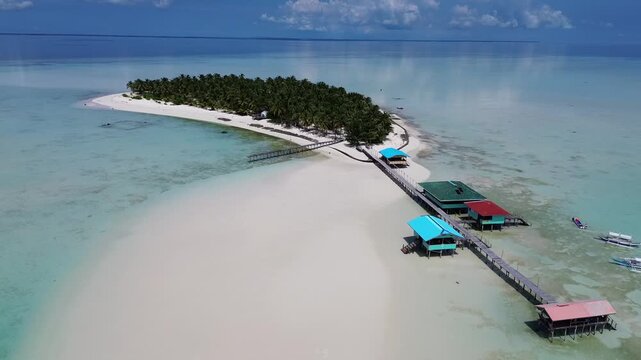 4K Drone Descending and Approaching Onok Island, Philippines .Aerial View of Coral Reefs. High quality FullHD footage
