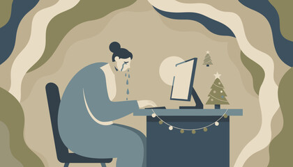 Crying woman at a computer desk during the holidays illustrating depression loneliness or burnout