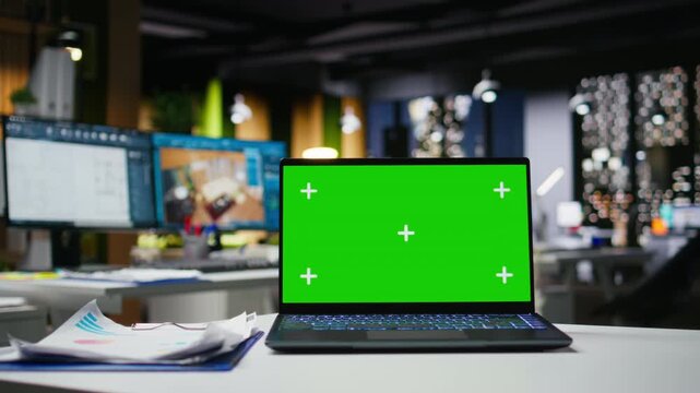 Green screen and CAD display on dual monitors at the architecture workstation with 3D render visualization. Digital environment blends creativity, technology and professional drafting tools.