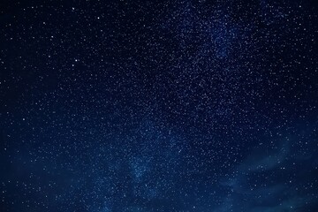Obraz premium Night Sky Illuminated With Numerous Stars Against Dark Blue Background