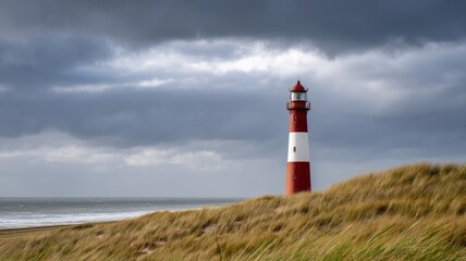 Striped lighthouse amid coastal dunes. AI image