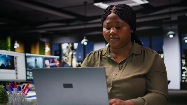 Woman business assistant at office sharing insights and data reports, focusing on budgeting and projections for efficient resource allocation. Successful company administration. Camera A.