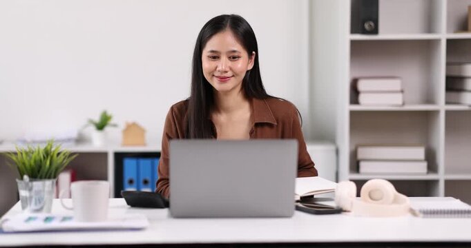 Modern office workplace with laptop computer, coffee cup and office supplies laptop office.	