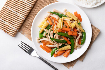 Stir fried vegetables, Green pea, Carrot, Baby corn and Shimeji mushroom with soy sauce, Asian vegetarian food, Healhty eating