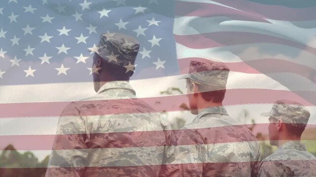Three service members standing, center raising arm saluting while flag overlay rippling, honoring