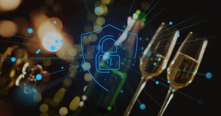 Blue particles emerging from bokeh tracing padlock and shield, showing security over bottle, flutes - Powered by Adobe