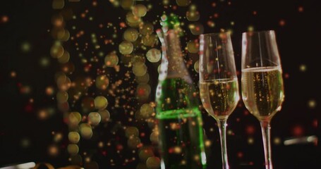 Gold particles rising left of green bottle, two flutes drifting toward glasses forming festive glow - Powered by Adobe