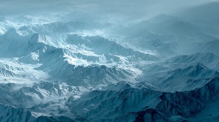 Snow Covered Mountain Range Aerial View Under Cloudy Skies in Blue Tones