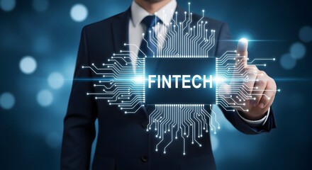 Businessman in a suit touching a fintech interface with glowing circuits and digital technology on a blue background representing financial technology and innovation in the modern era of finance