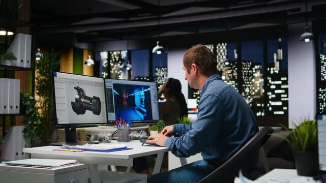 Male IT engineer uses AI techniques to create video game and a turbine, futuristic gaming design for a Mars station project. Sci fi system for a modern game lobby, professional software. Camera A.