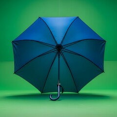 A vibrant blue umbrella with a curved handle standing open against a bright green background, showcasing its detailed fabric and structural design