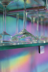 macro shot of glasses resting on shelf casting ultrabright reflections of solar activity