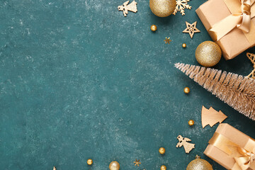 Fototapeta premium Frame made of decorative Christmas tree, gifts and balls on blue background