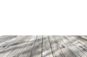 Weathered wooden planks with dappled shadows create a rustic surface.