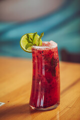 Blackberry mojito cocktail with a lime and mint garnish at a modern Mexican food restaurant 