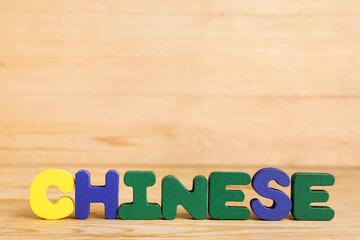 Text CHINESE on wooden background