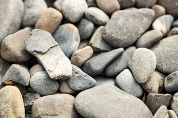 Texture of pebbles as background, closeup
