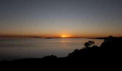 Obraz premium beautiful orange sunset at Rio de la plata3