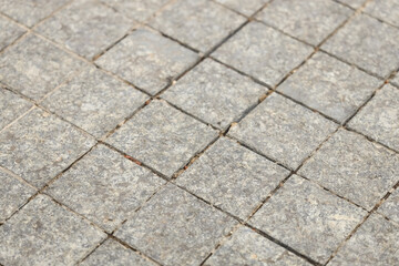 Texture of granite tiles as background, closeup