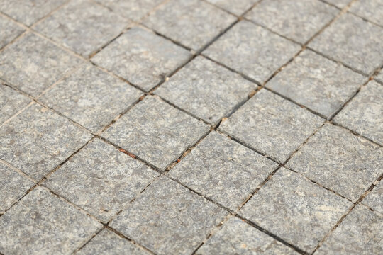 Texture of granite tiles as background, closeup