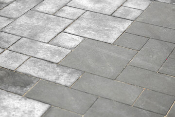 Fototapeta premium Texture of paving stones as background, closeup
