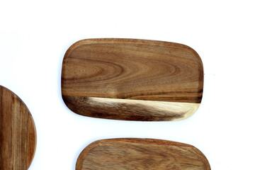 Wooden cutting board on white background.
