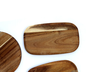 Wooden cutting board on white background.