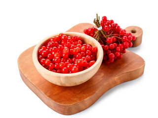 Wooden bowl and board with fresh viburnum berries on white background