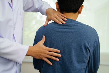 Physical therapy, Asian therapist doctor treat perform pain therapy in hospital.
