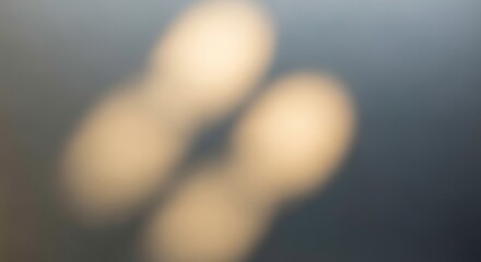 Abstract bokeh lights background with soft focus and warm glow