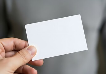 Blank business card in hand for design mockup and branding concept