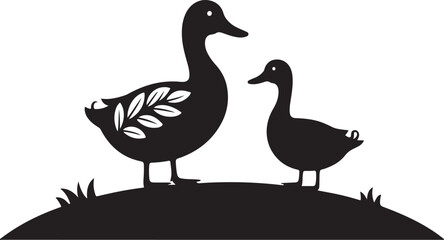 Fototapeta premium Two black silhouette ducks standing on a grassy mound with a white leaf pattern on one duck