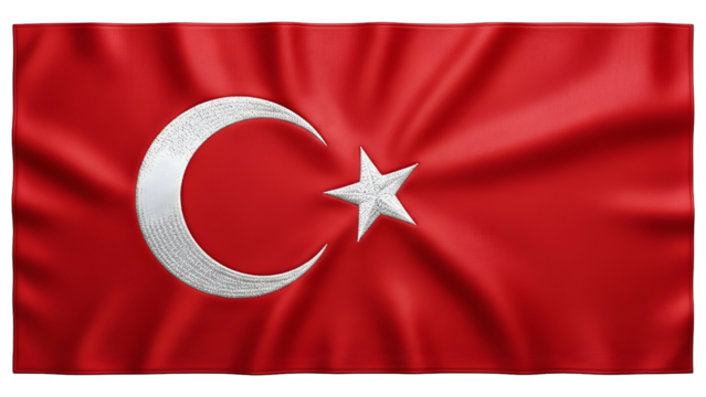 Waving national banner displaying a white crescent moon and star motif prominently on a rich red field