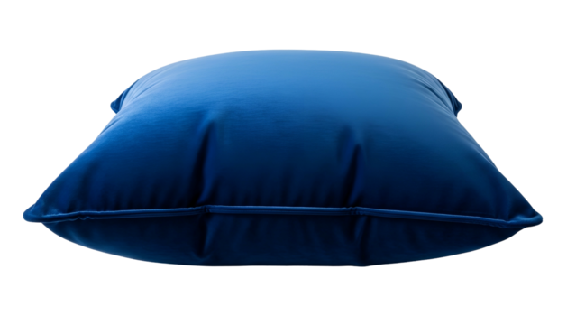 Plush indigo textile cushion rests isolated against a pure black background