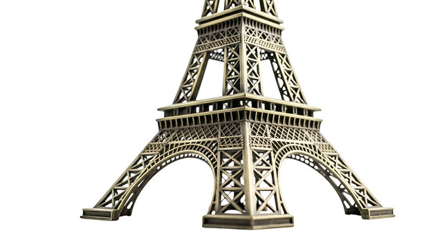 Detailed miniature replica of a famous iron lattice tower structure against a dark background - Powered by Adobe