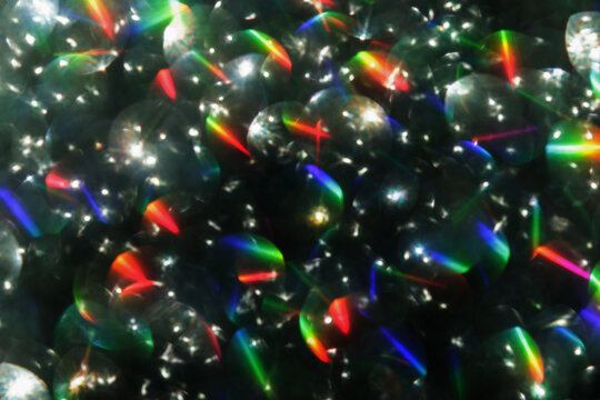 Colorful glitter rainbow glow light flare sparks abstract overlay texture